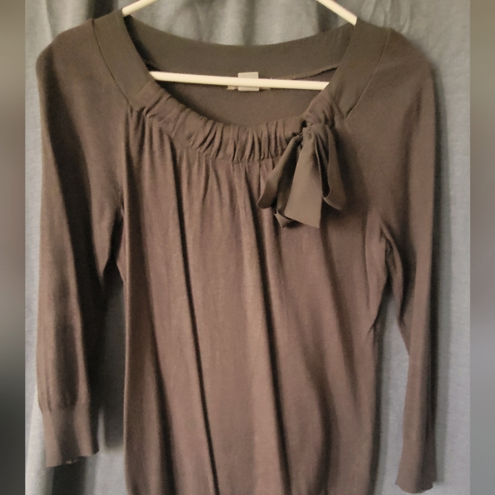 Gray sweater, with a scooped neck line and 3/4 length sleeves